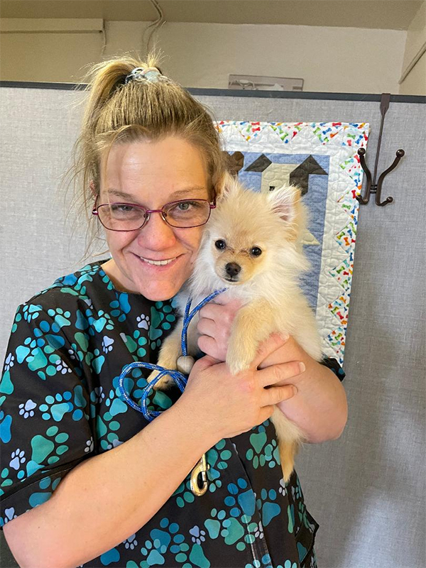 Groomer with small dog